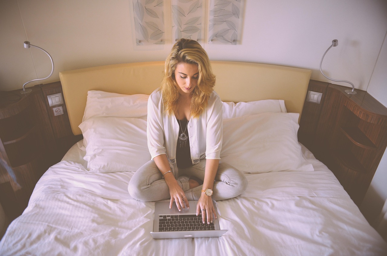 Woman, working, bed — Unraveling the Significance: Why Free UFC Streams Matter
